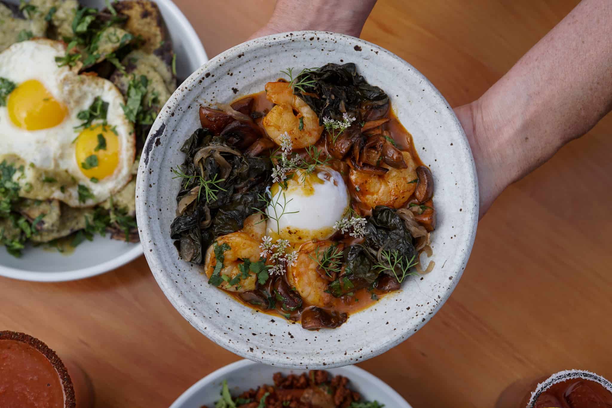 Variety of brunch dishes; featuring shrimp & masa polenta
